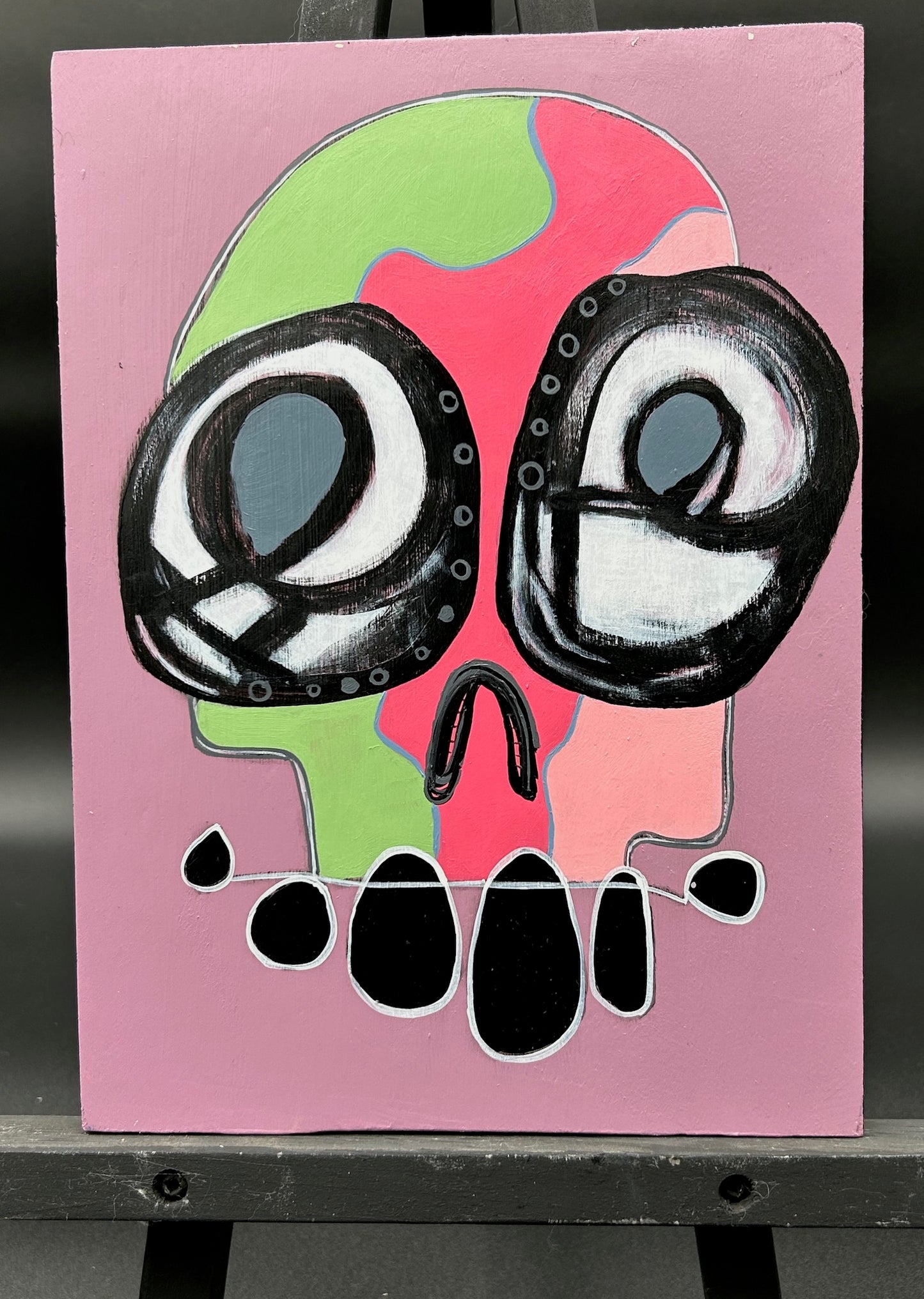 SKULL ON WOOD BOARD