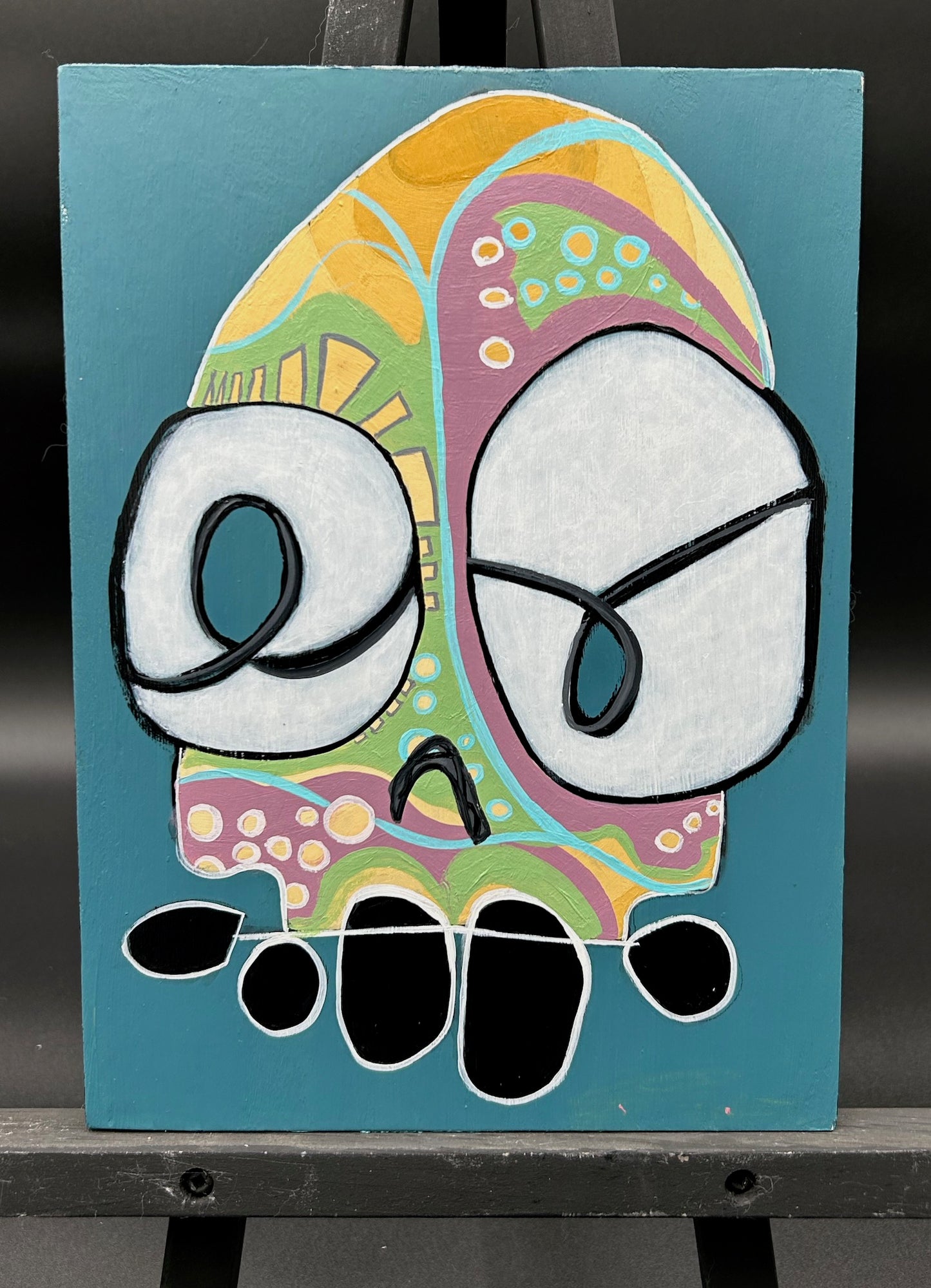 SKULL ON WOOD BOARD