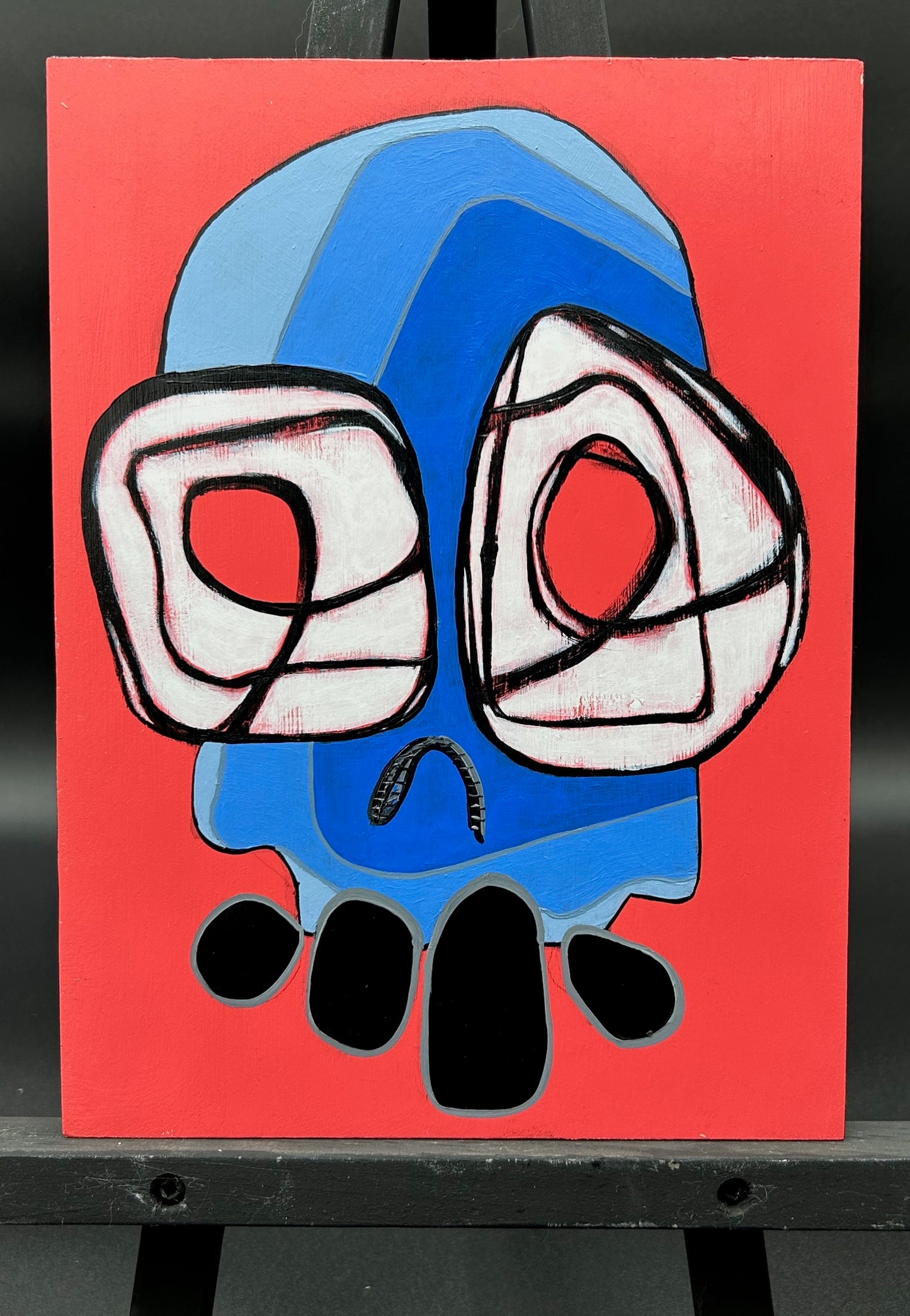 SKULL ON WOOD BOARD