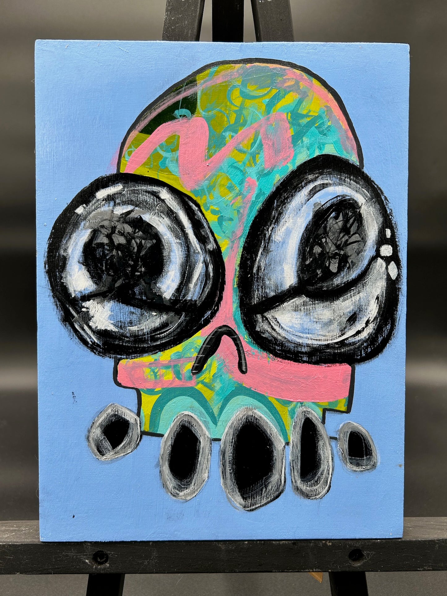 SKULL ON WOOD BOARD