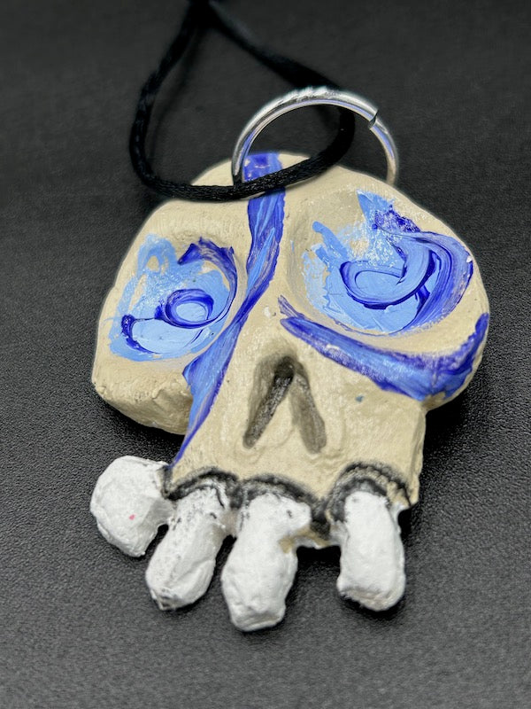 CLAY SKULL ORNAMENT