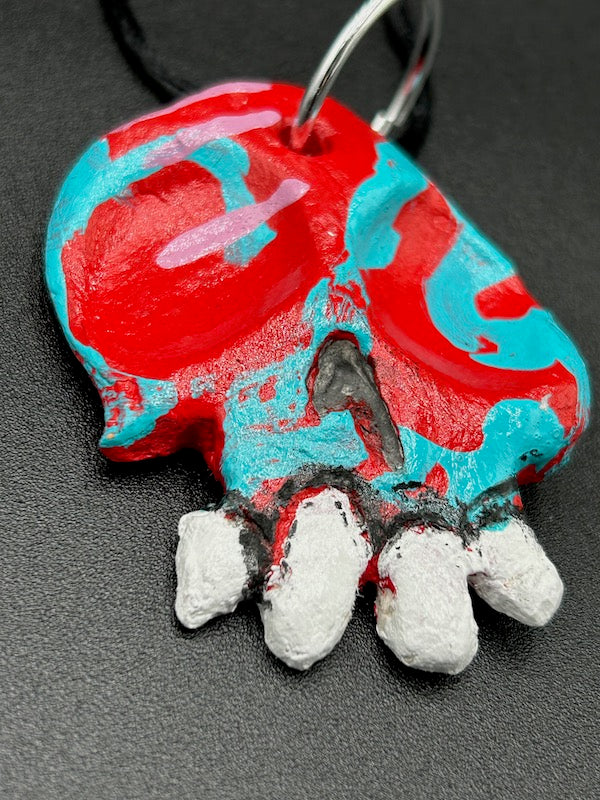 CLAY SKULL ORNAMENT