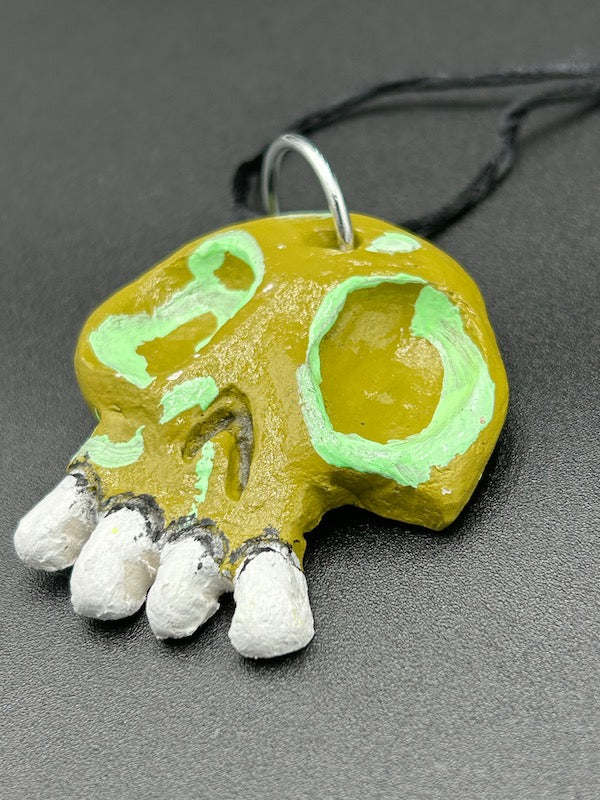 CLAY SKULL ORNAMENT