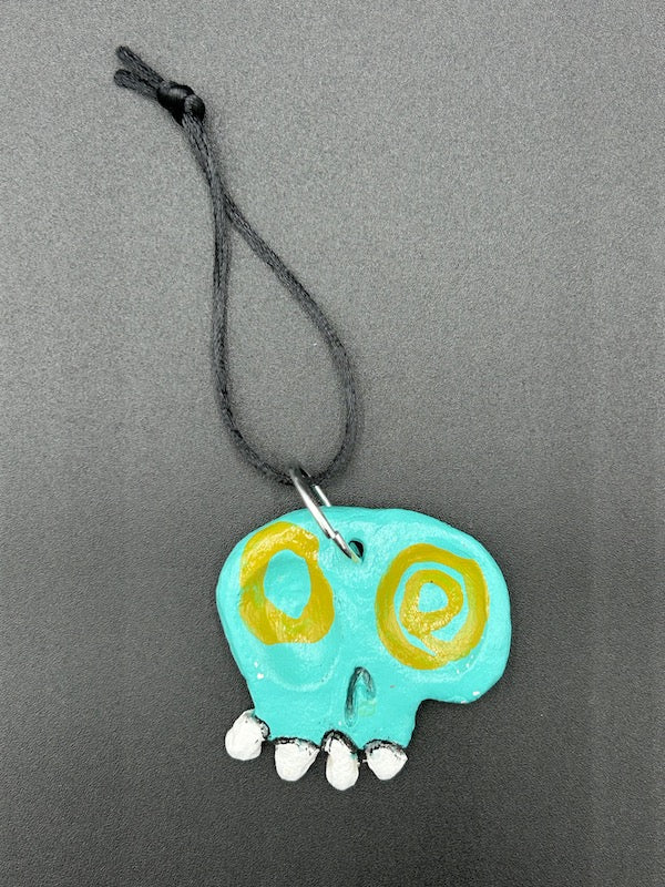 CLAY SKULL ORNAMENT