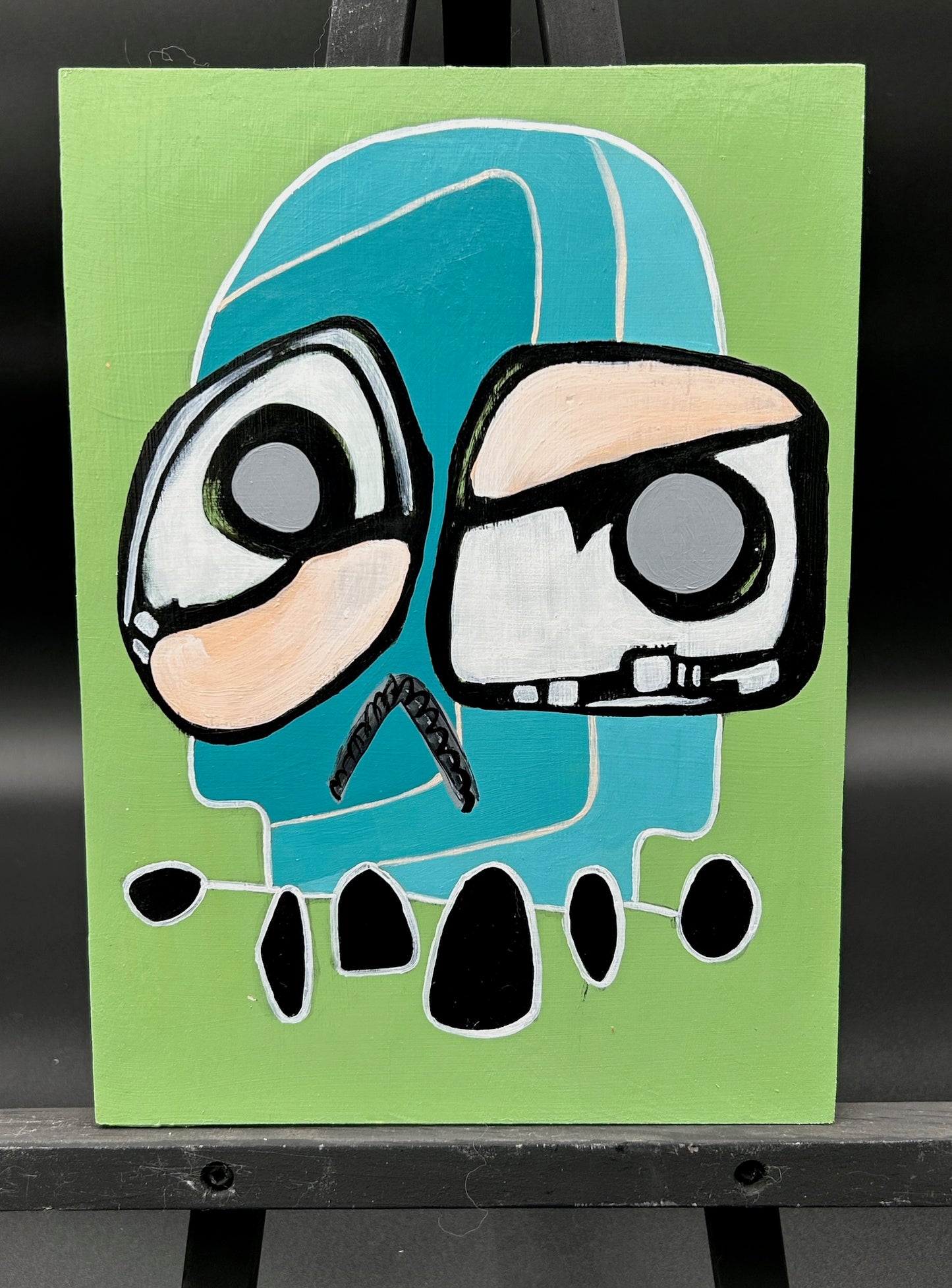 SKULL ON WOOD BOARD