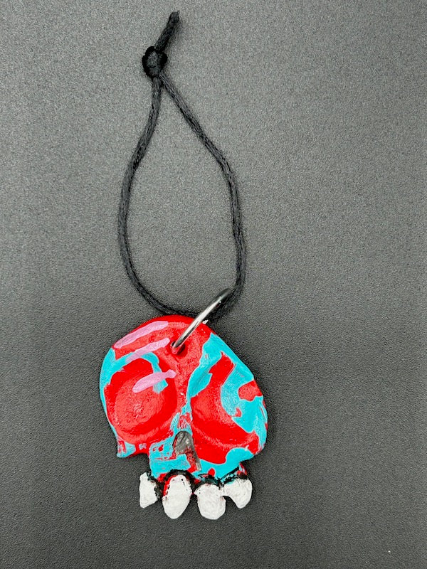 CLAY SKULL ORNAMENT